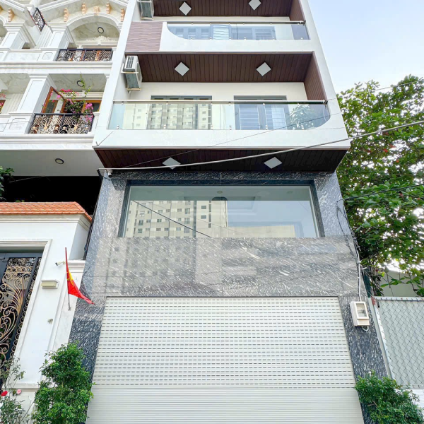 Nhà phố lô nhì Huỳnh Tấn phát xe hơi vào nhà có thang máy chỉ 13tỷ500tr